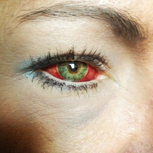 Makeup disguises a fractured eye, as she prepares to board a train home. After a night of heavy drinking with friends, she came to consciousness in a hotel room with her ex-boyfriend choking her and kicking her in the groin. She moved to Williston with her boyfriend less than three weeks prior to seek work.